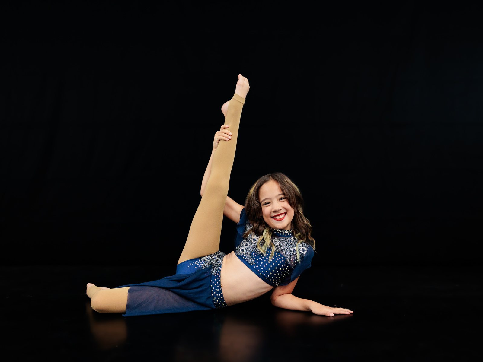 Picture day portrait of a smiling dancer in costume by Thistle & Quill Photography