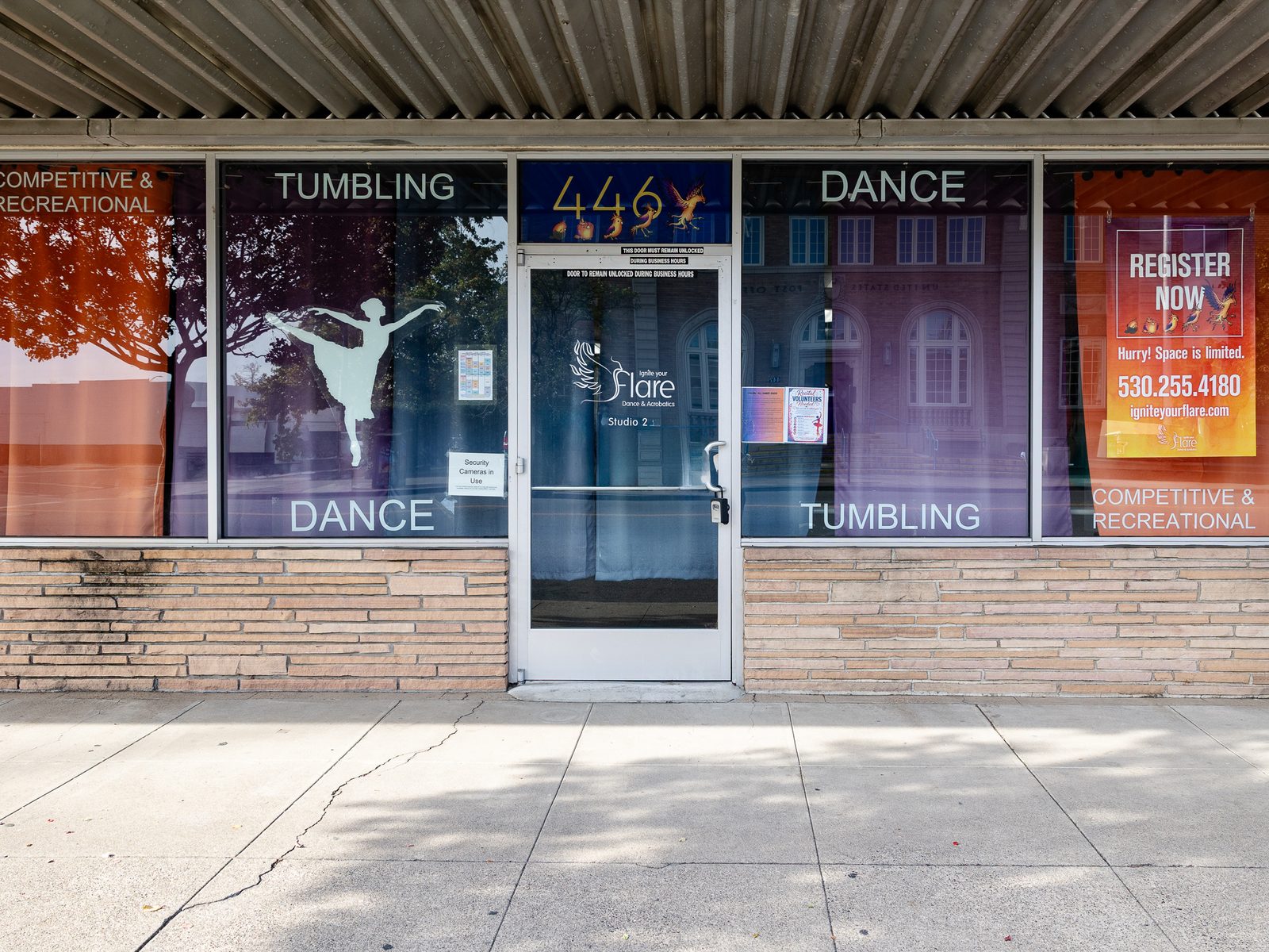 Studio 2 storefront at 446 Walnut St. with Dance and Tumbling window signs
