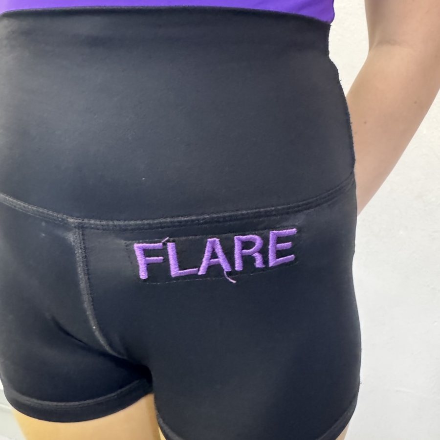 Black uniform shorts with a purple embroidered FLARE logo