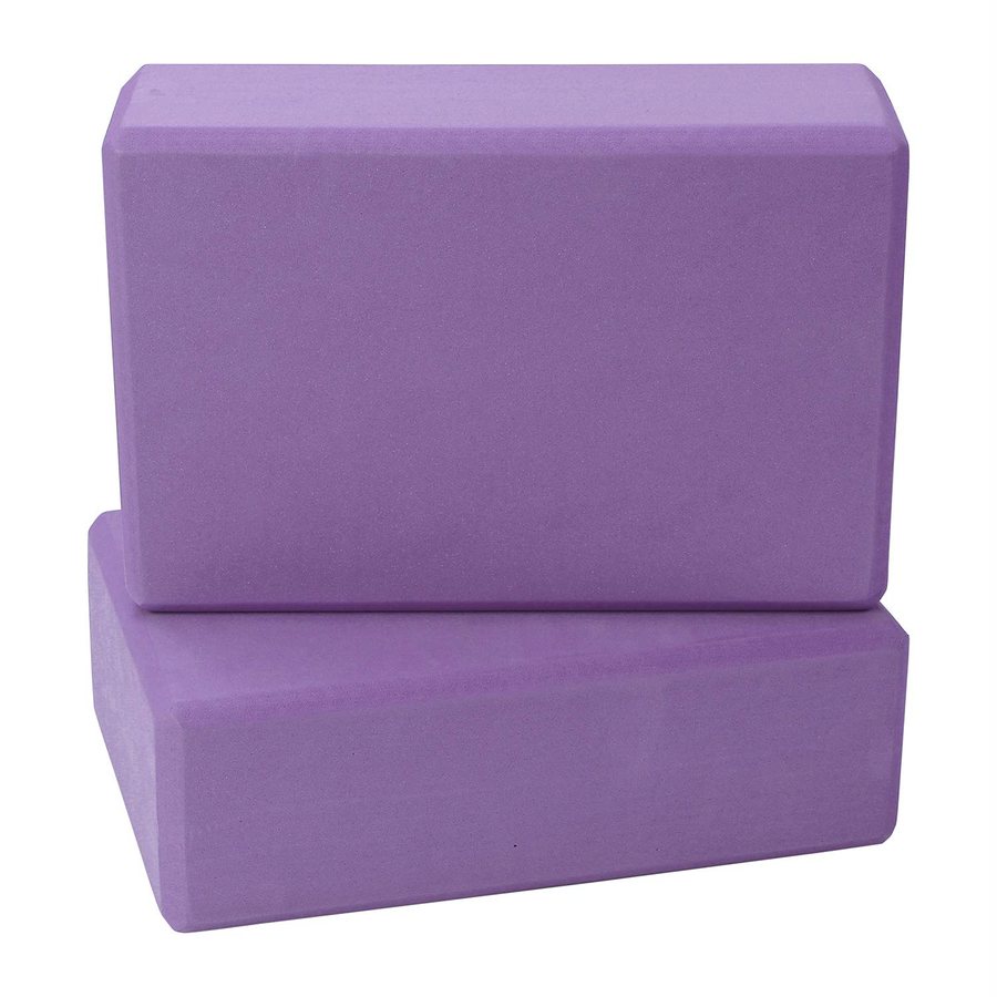 Two purple foam yoga blocks